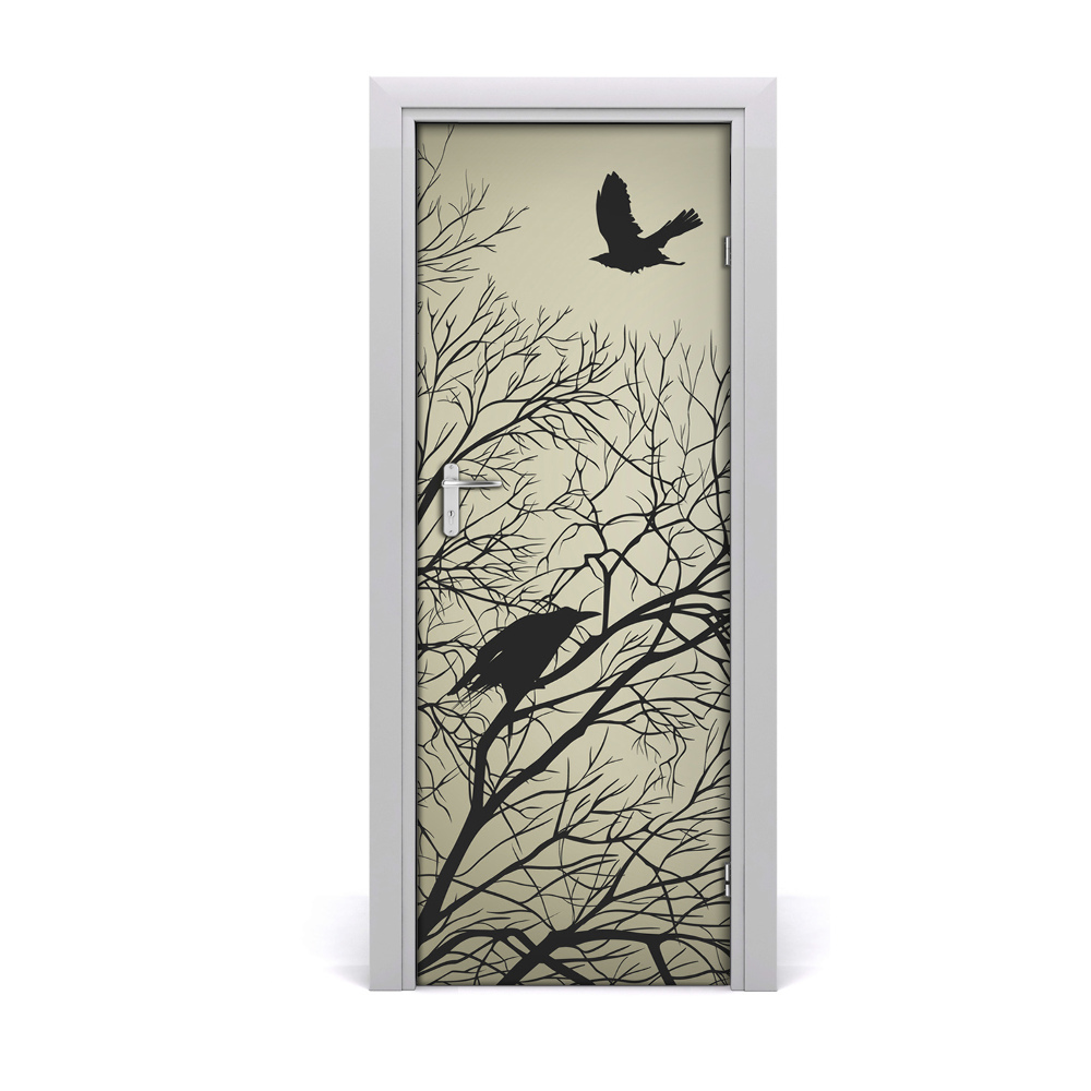 Autocolant de uşă Ciorile într-un copac
