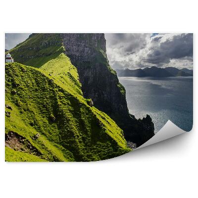 Decor fototapet Farul Kallur Insulele Feroe Munți Iarbă Ocean Cer Nori