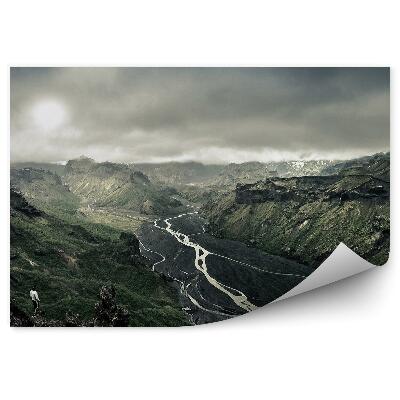 Decor fototapet Peisaj întunecat dealuri râu cer înnorat