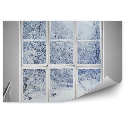 Fototapet perete Fereastră cu vedere la pădurea înzăpezită