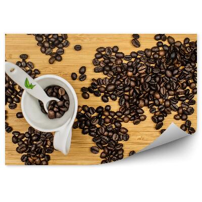 Decor fototapet Boabe de cafea harta lumii cana lingura masa din lemn