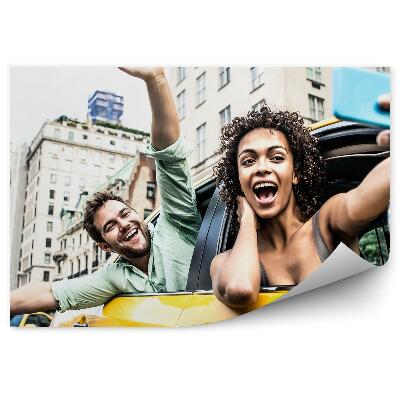 Decor fototapet Oameni zâmbind într-un taxi galben