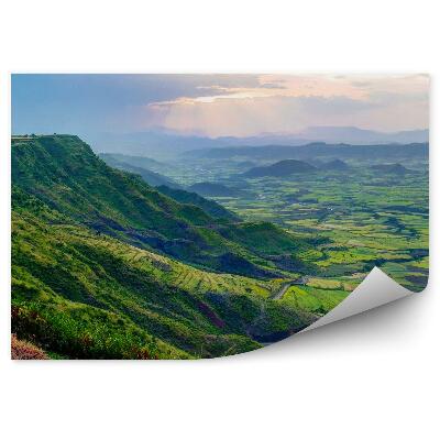 Fototapet vintage Panorama Munților Drum Câmpuri Plante Verzi Cer Nori Soare
