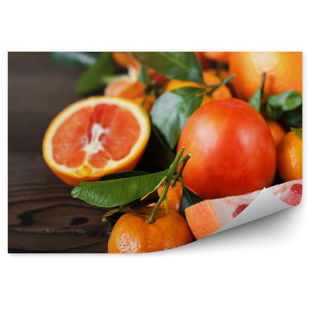 Fototapet vintage Fructe grapefruit bucati frunze de mandarina fundal inchis