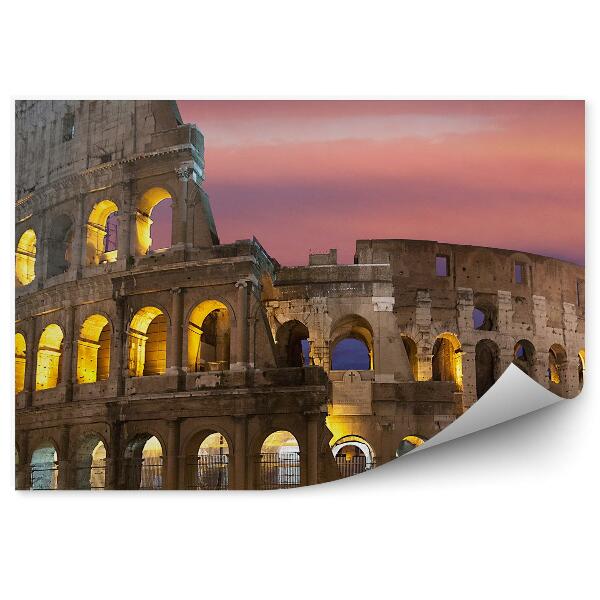 Fototapet pentru perete Colosseumul luminat pe fundalul unui cer colorat