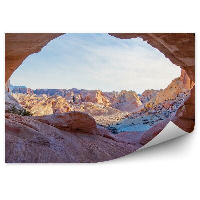 Decor fototapet Fereastră din stâncă cu vedere la o vale de munte