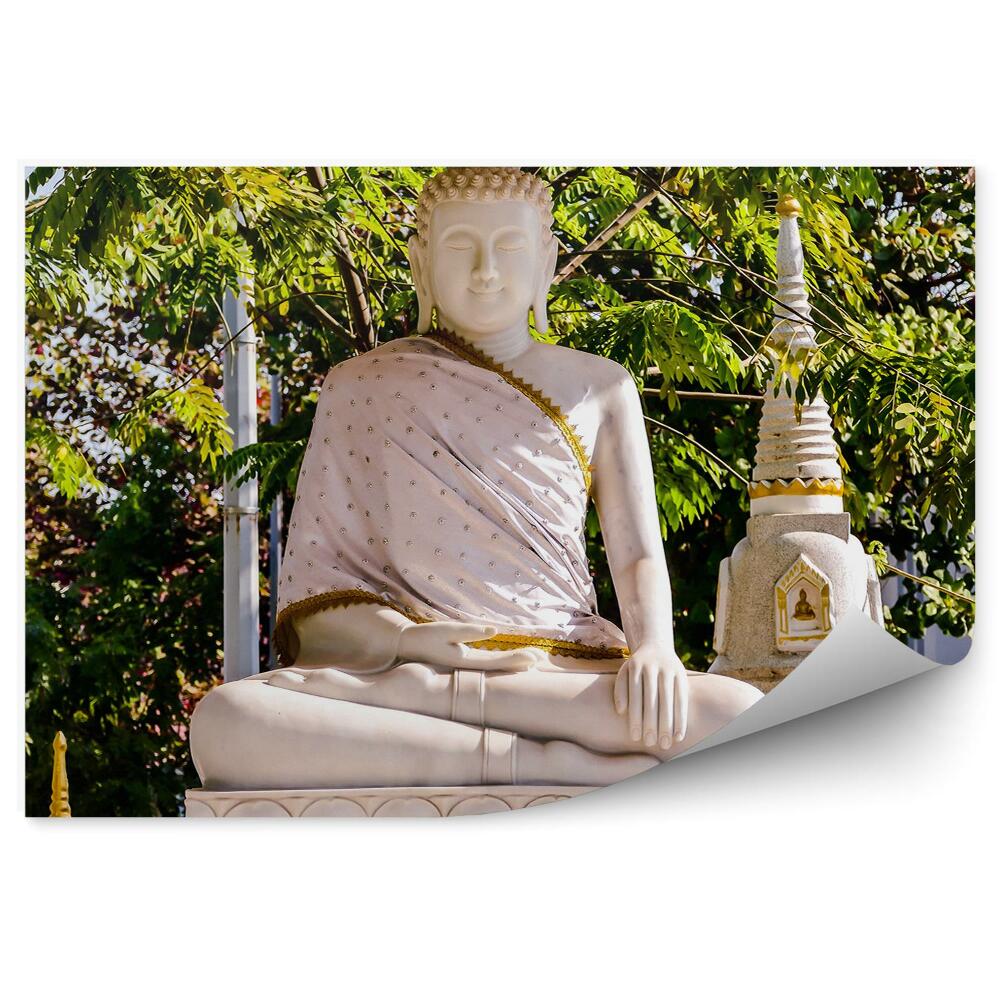 Fototapet Statuia lui Buddha zâmbind decorațiuni de copac de aur