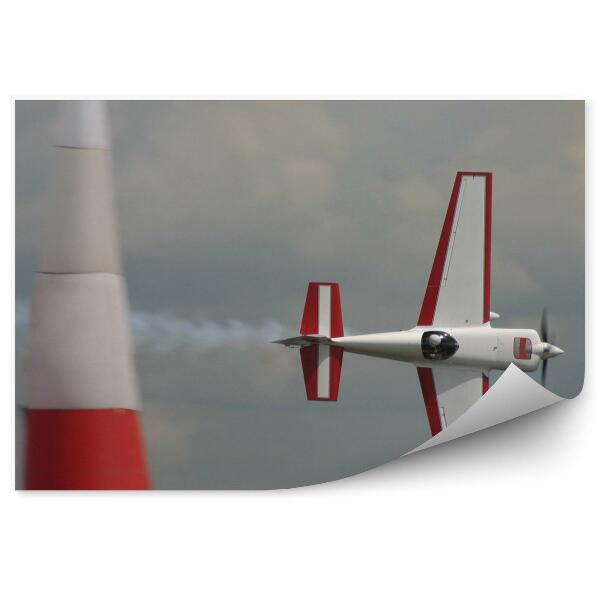 Fototapet pentru perete Avion care zboară lateral pe cer înnorat