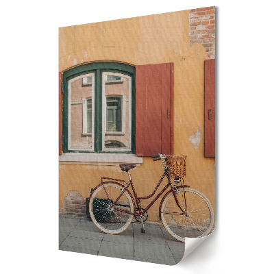 Grafică murală pe pânză O bicicletă fermecătoare lângă un perete colorat