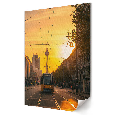 Grafică murală pe pânză Apus de soare peste un tramvai din Berlin