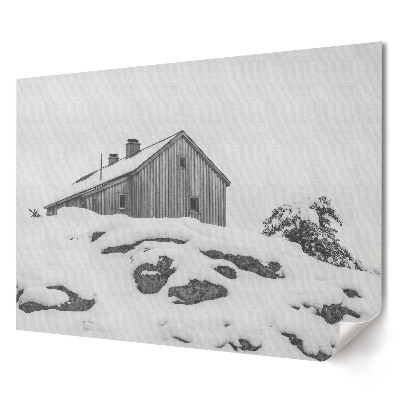 Tablou canvas modern Peisaj de iarnă cu o casă în zăpadă